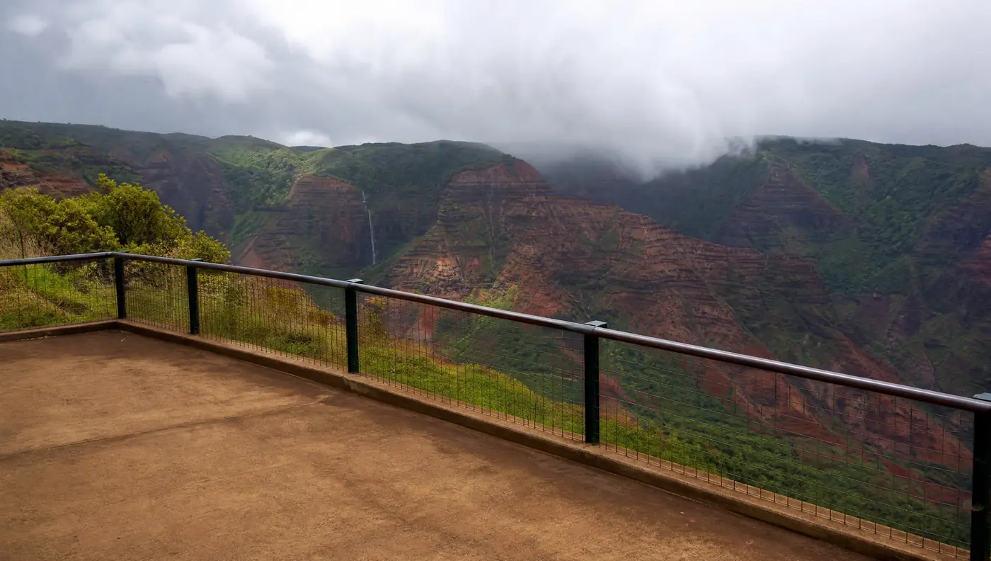 Puʻu Hinahina Lookout, where the working canyon view is. Mornings clear; afternoons cloud in.